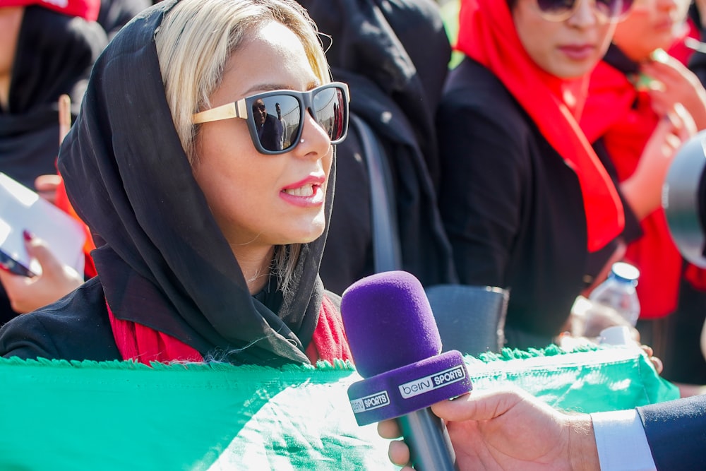 woman wears black hijab scarf