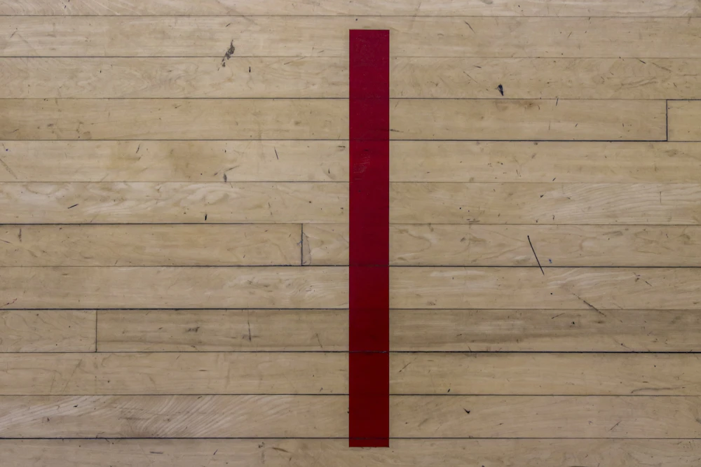 Brown parquet floor pattern showing the joint lines a floor carpenter aligns