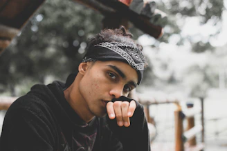man wearing black top