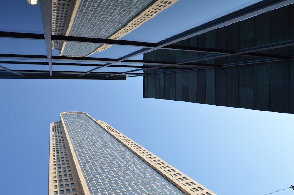 white concrete buildings under clear blue sky