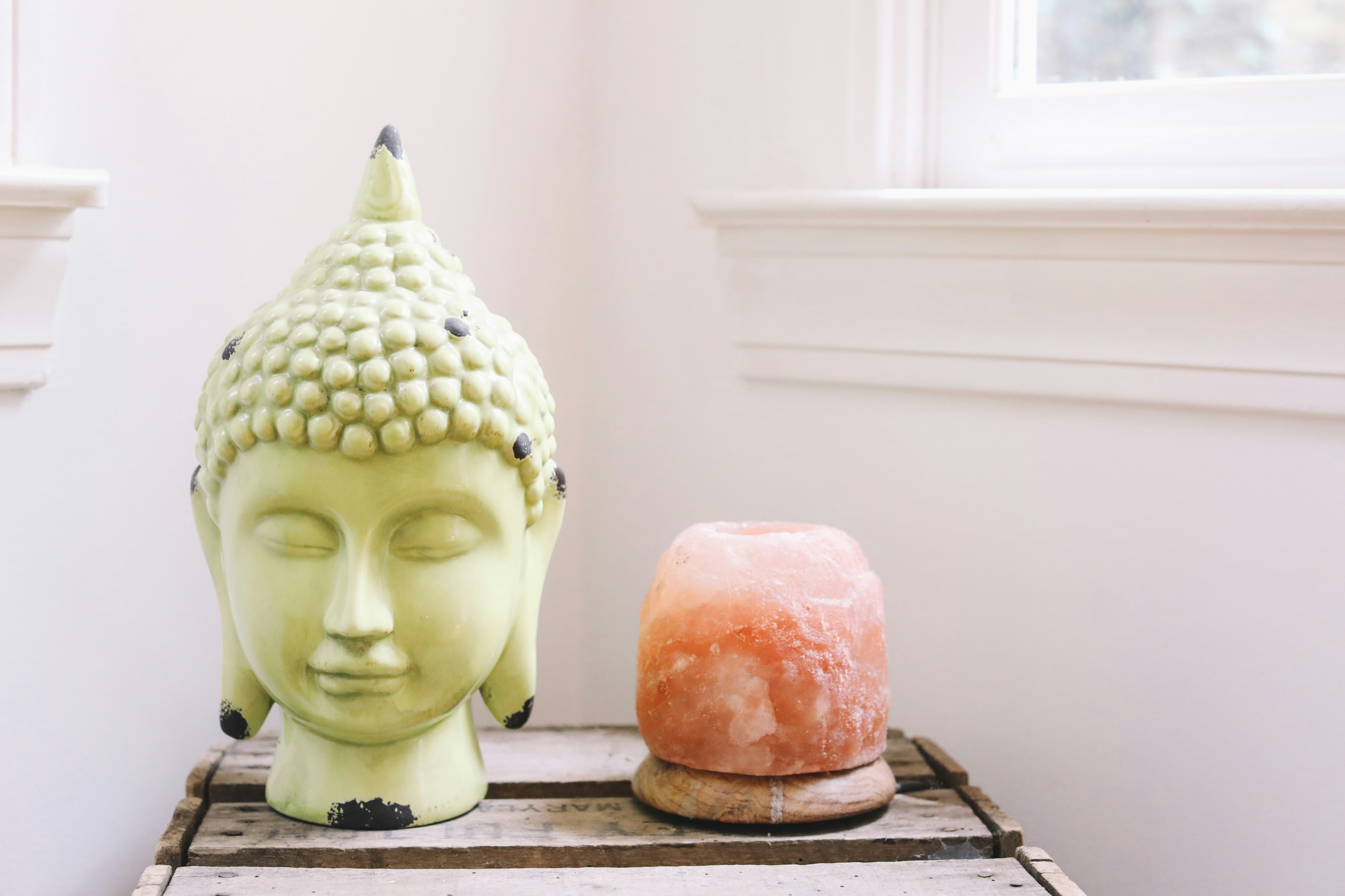 green Buddha head statue