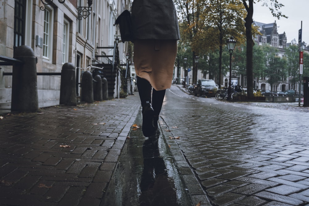 person walking on road