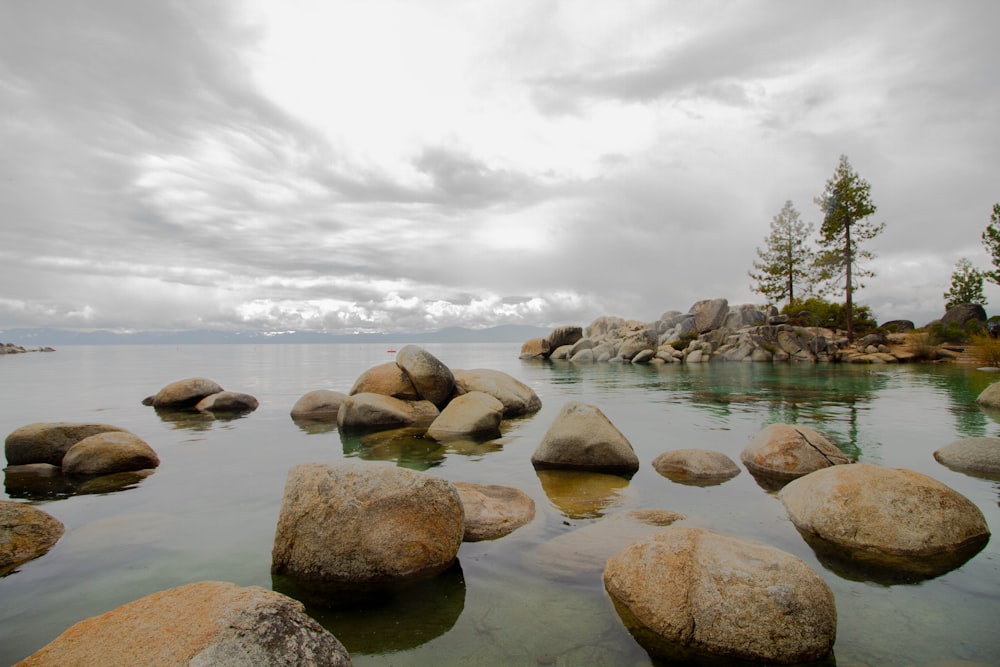 rocks on body of water