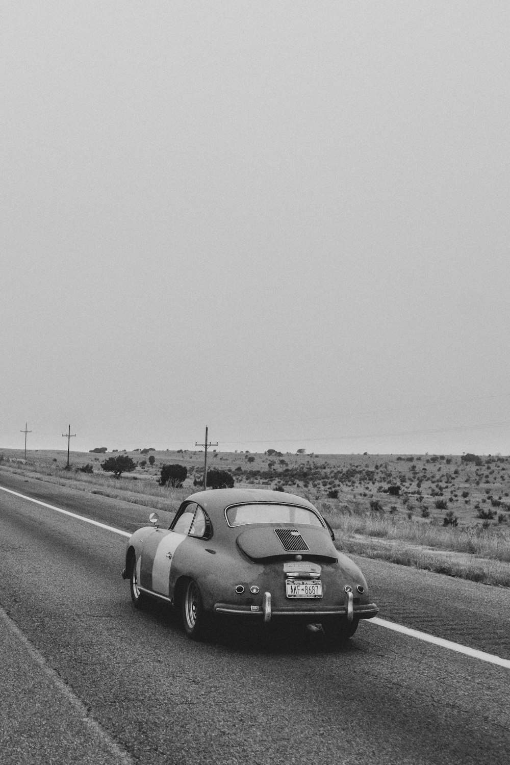 greyscale photography of vehicle