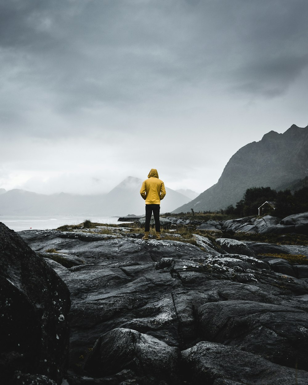 man standing on rocks