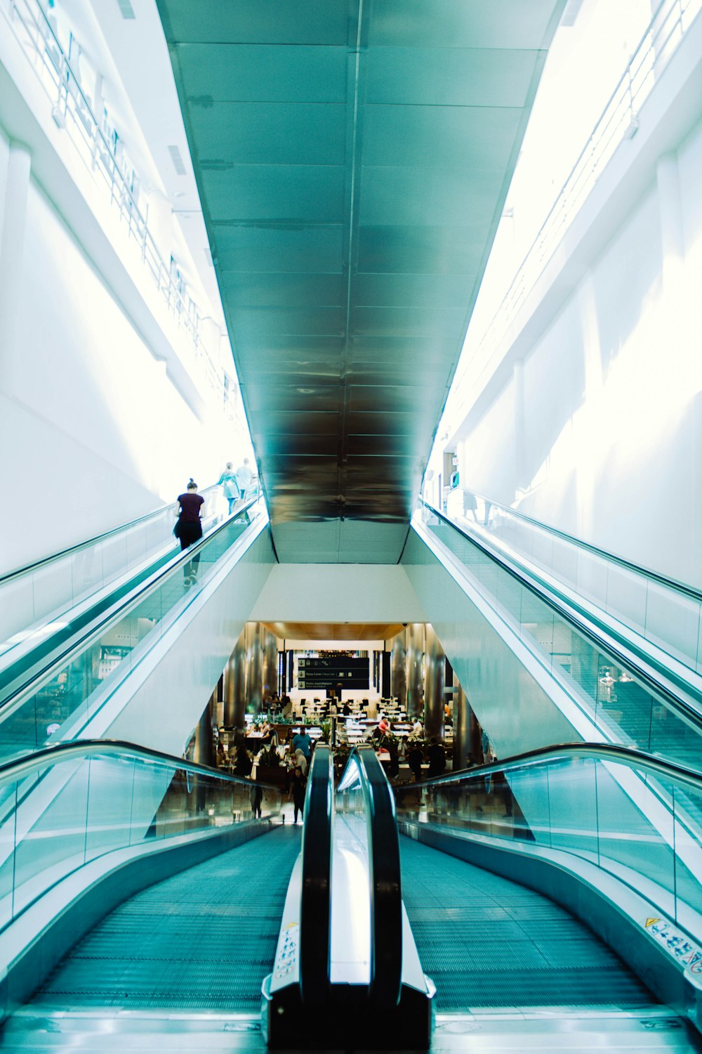 high-angle photography of two escalators
