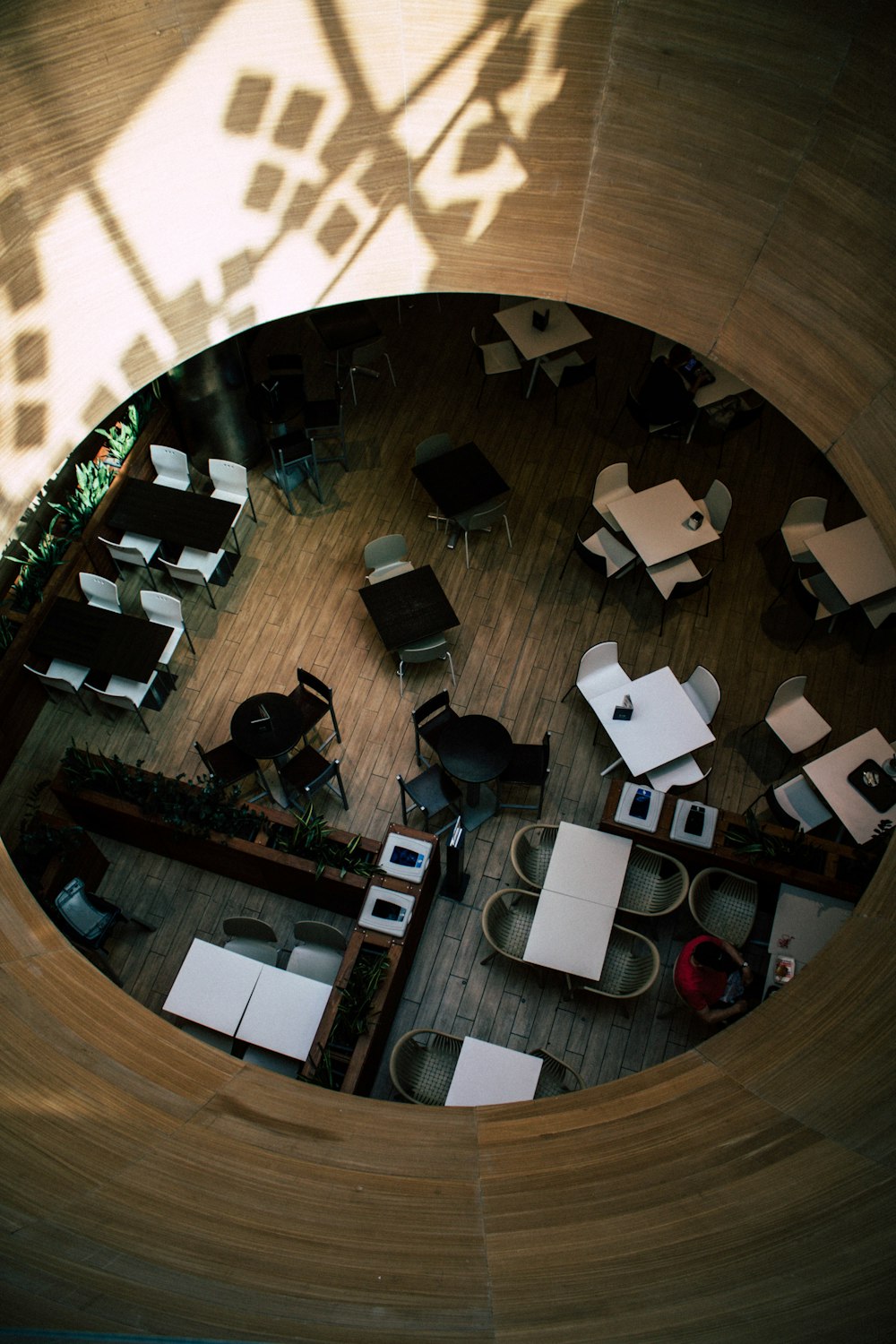 high-angle photography of tables and chairs