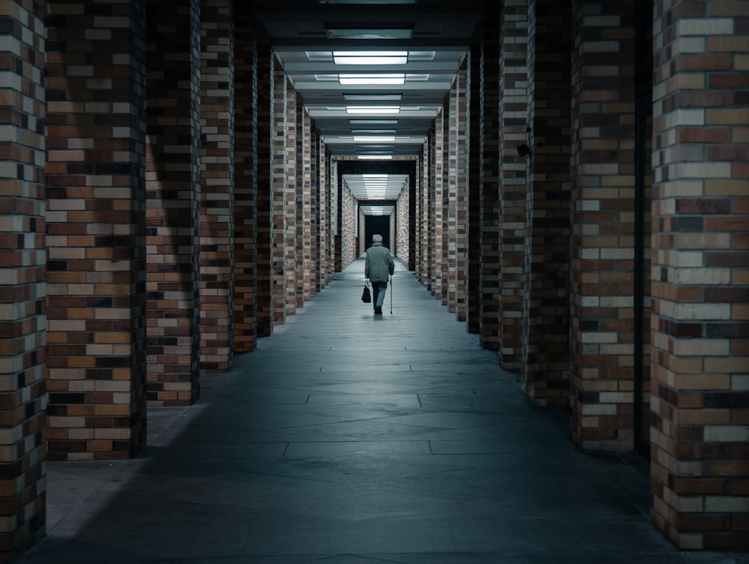 man walking on hallway