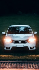 white Honda vehicle during daytime
