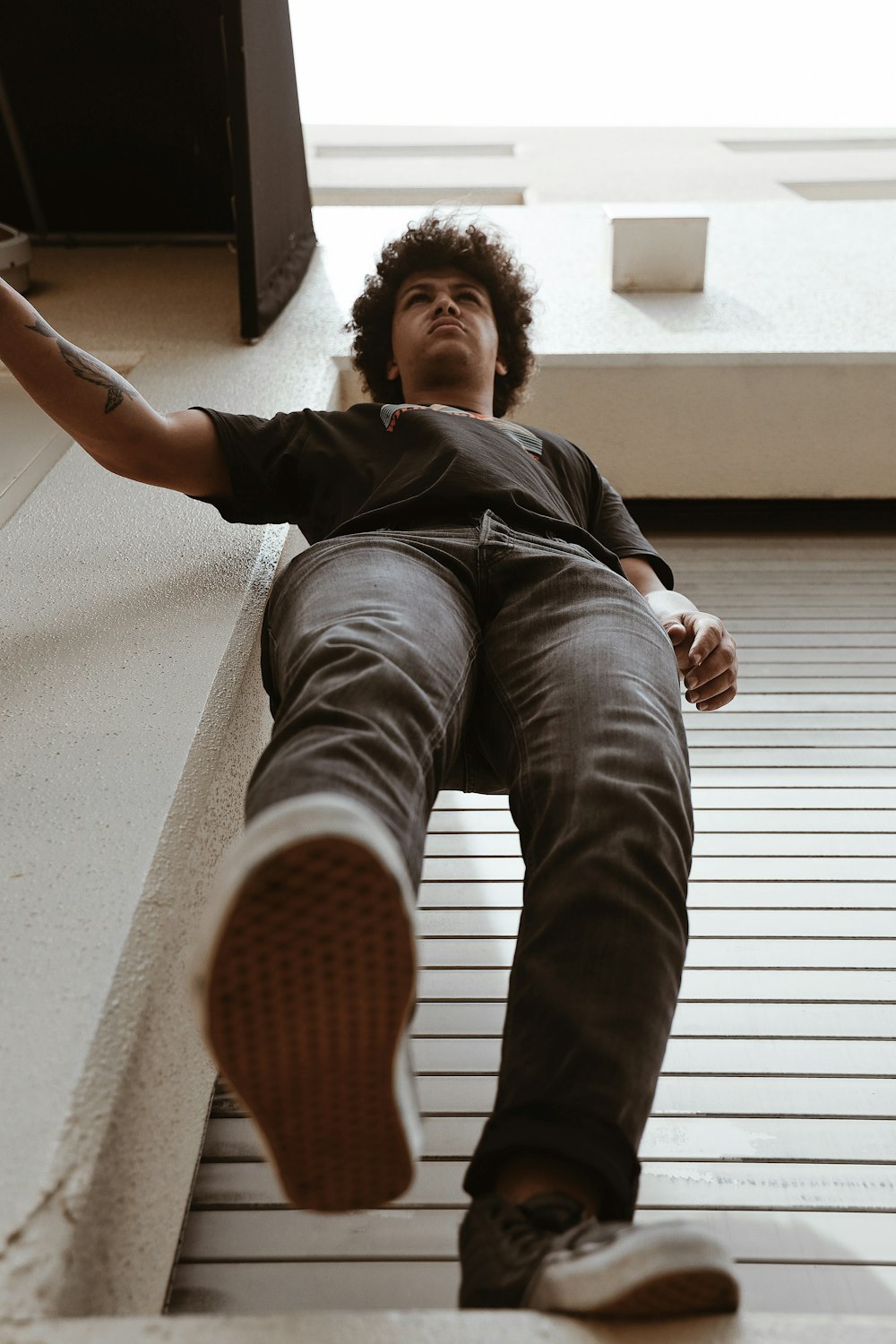 man wears black crew-neck t-shirt