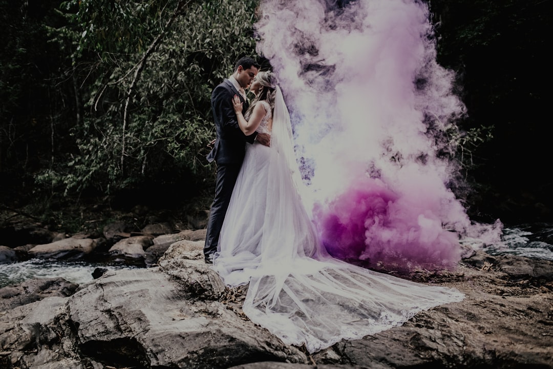 groom and bride standing outdoors