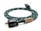 A coiled green woven power cable with white accents features a wooden label that reads 'Arapuni PH-1, Designed in New Zealand.' The plug is black with visible metal prongs and labeled 'Furutech.'