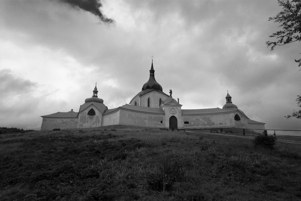 grayscale photography of historic building