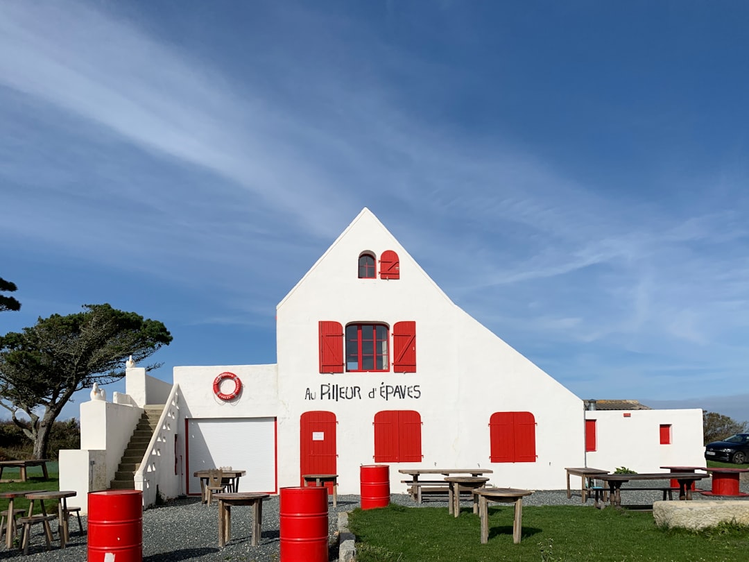 white and red building