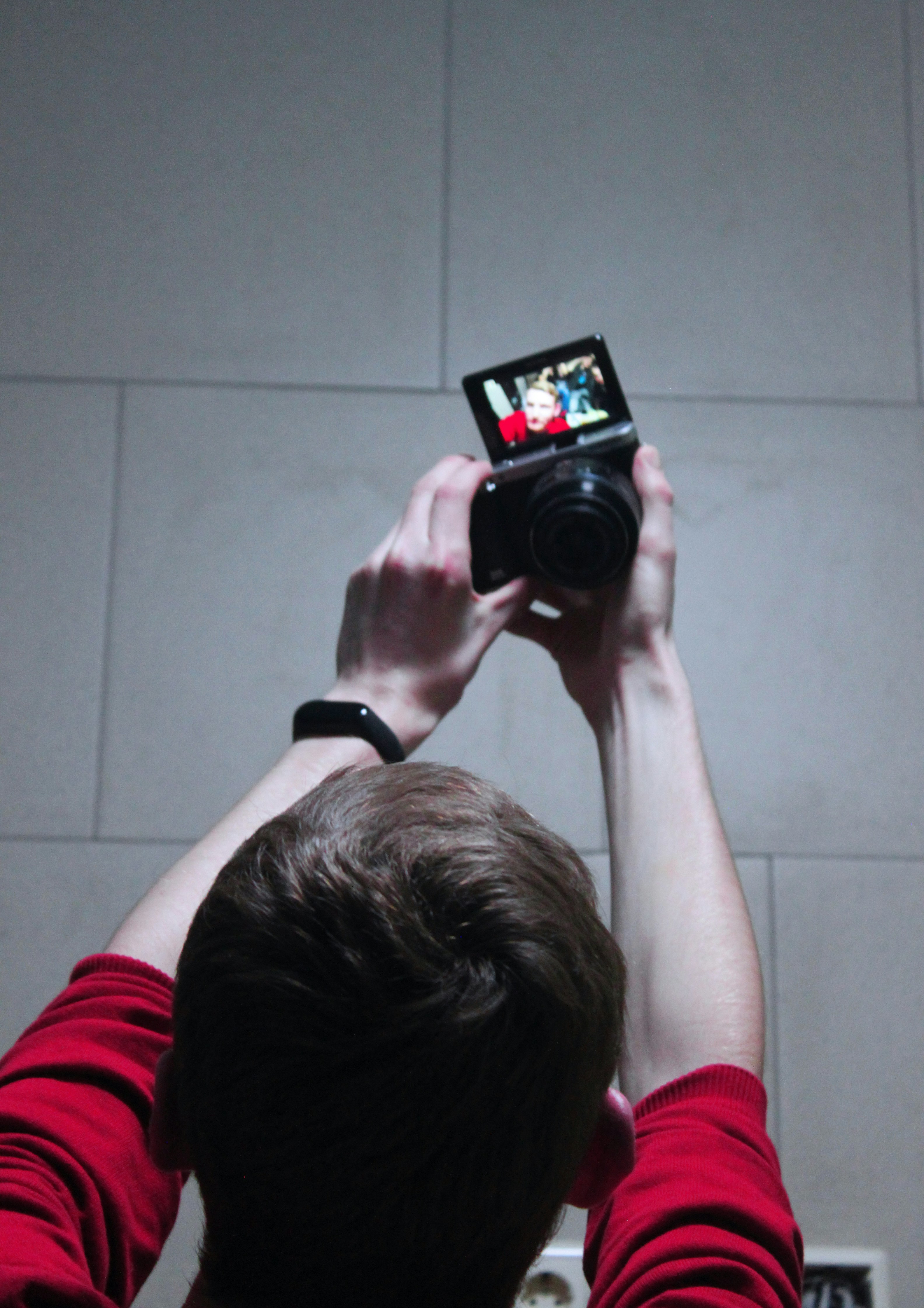 close-up photography of man taking selfie