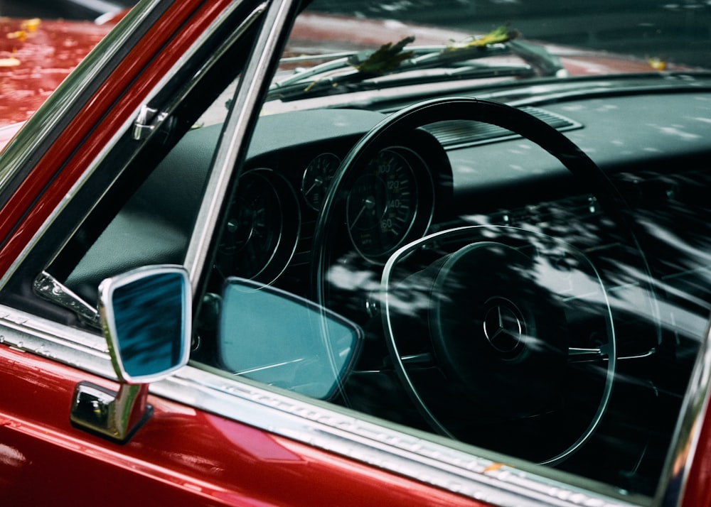 red vehicle close-up photography