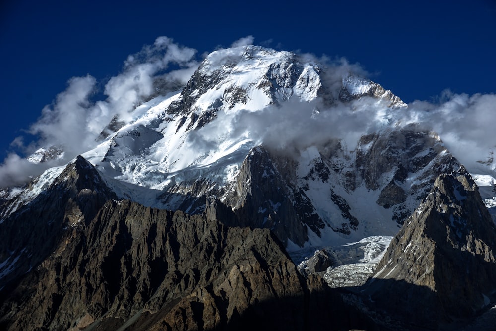 black and white mountain under blue sky at daytime