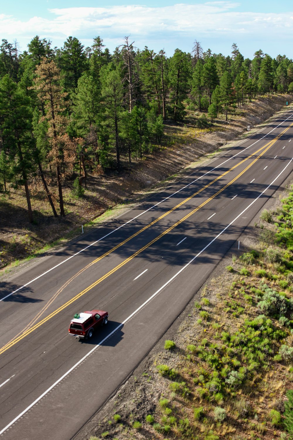 red truck crossing road