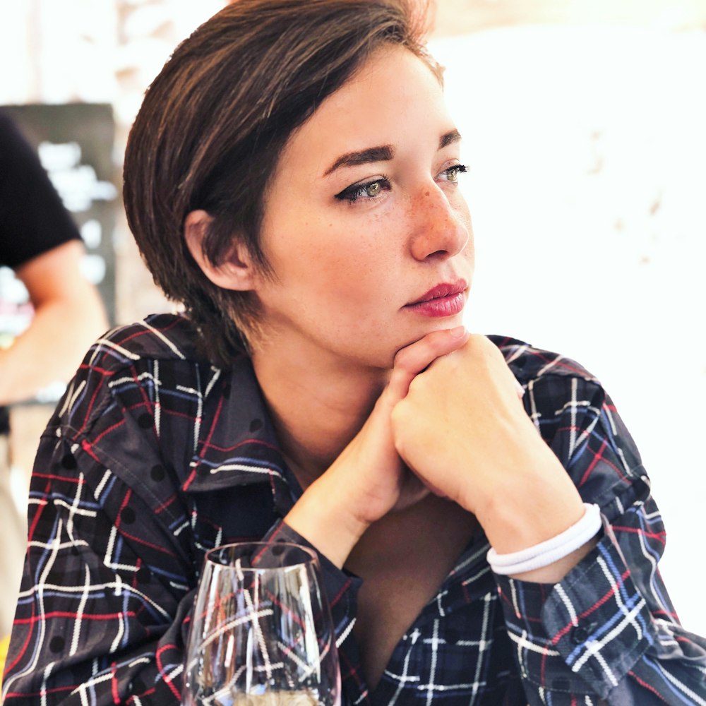 woman wears black long-sleeved shirt