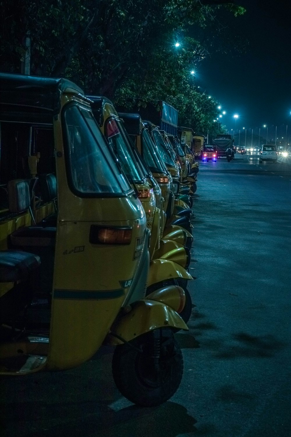 yellow auto rickshaw