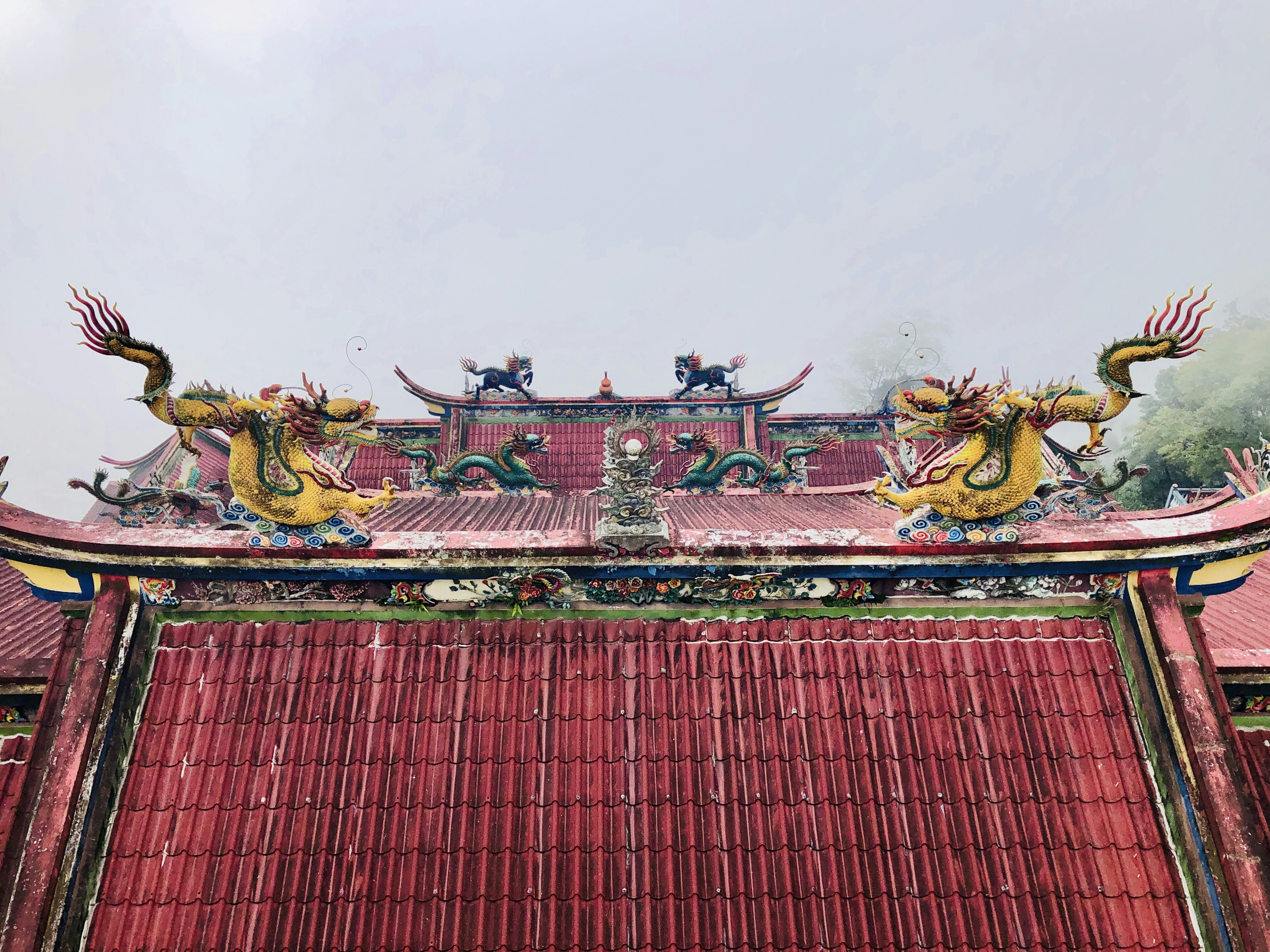red and gold temple during day