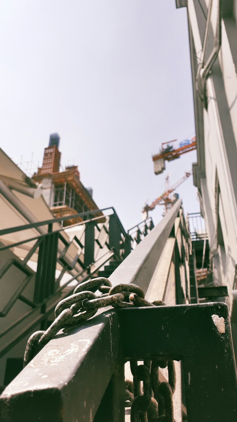 gray metal chain on rails