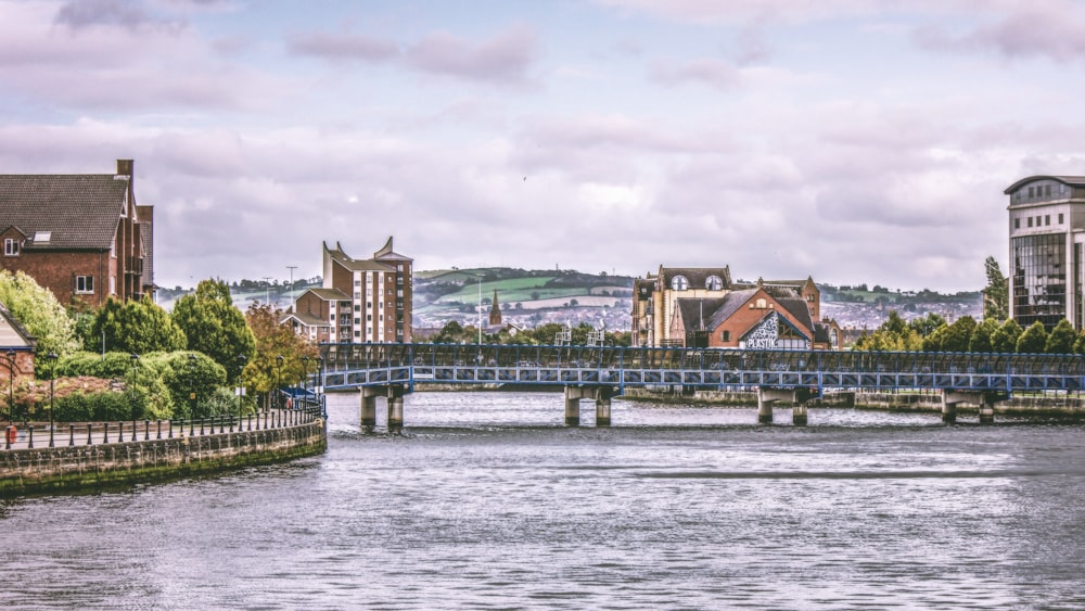 buildings near body of water at daytime