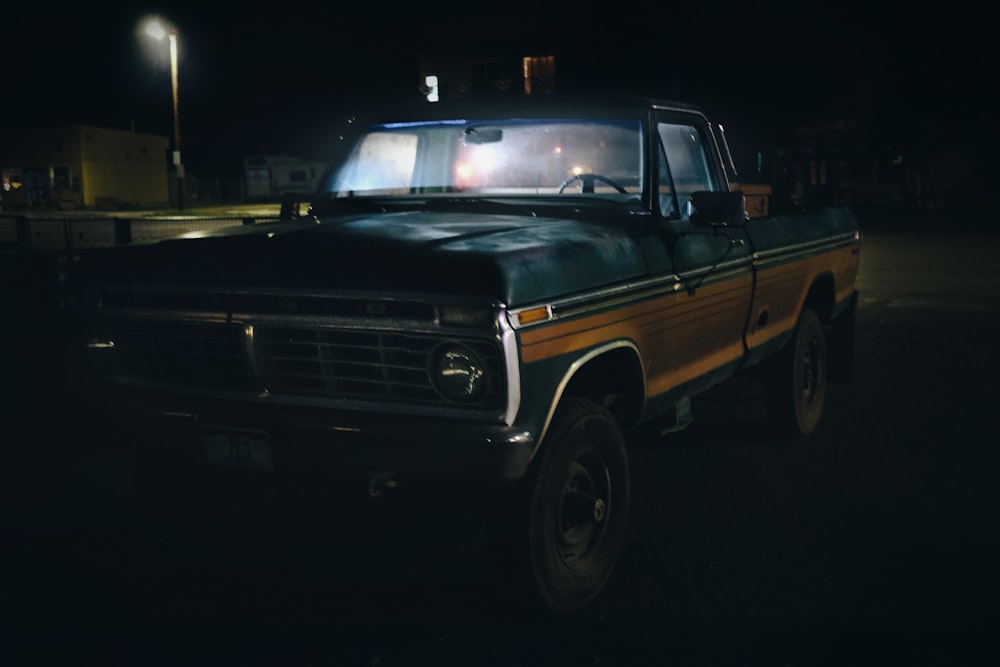 empty single cab pickup truck parked during night