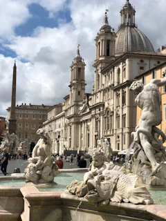 Ornate fountains and baroque architecture in Olomouc’s main square