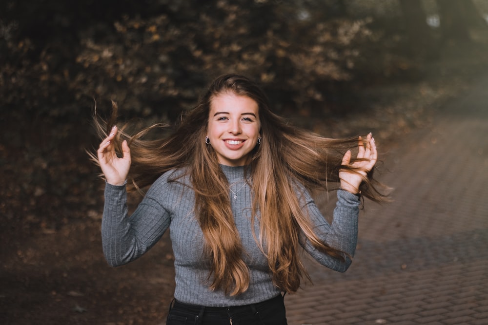 woman in gray sweater