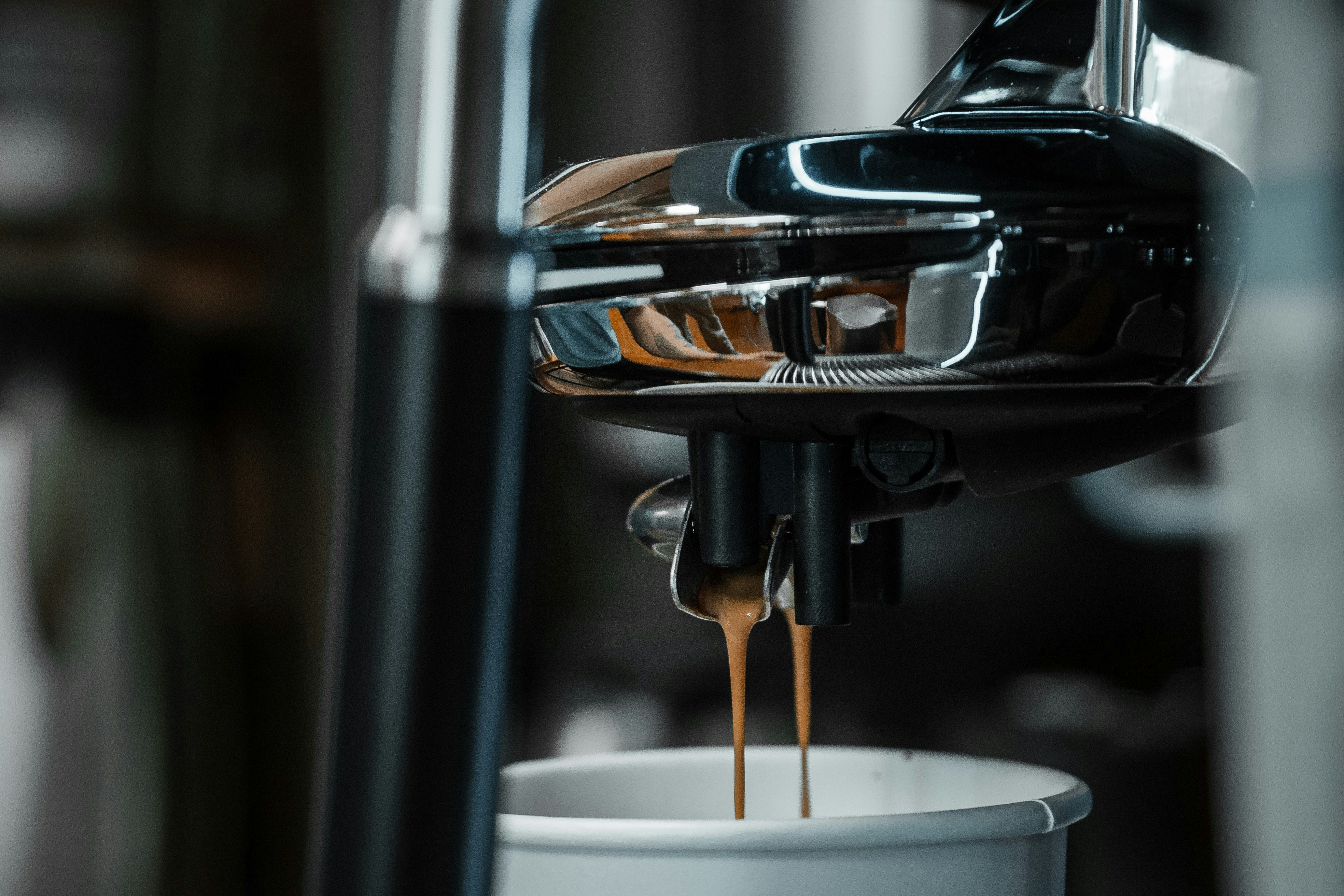Espresso machine pouring into a cup