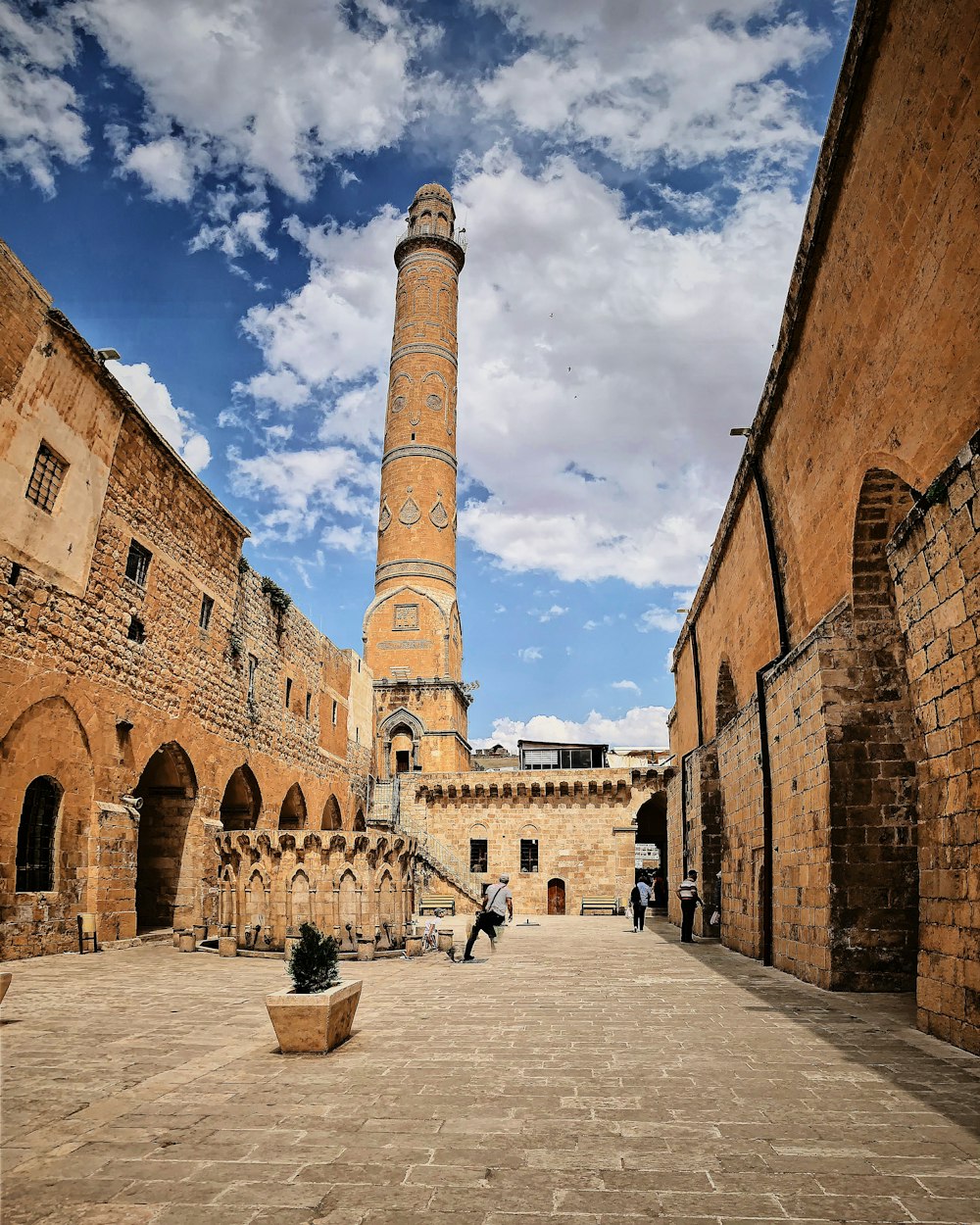 a tall tower with a clock on it's side