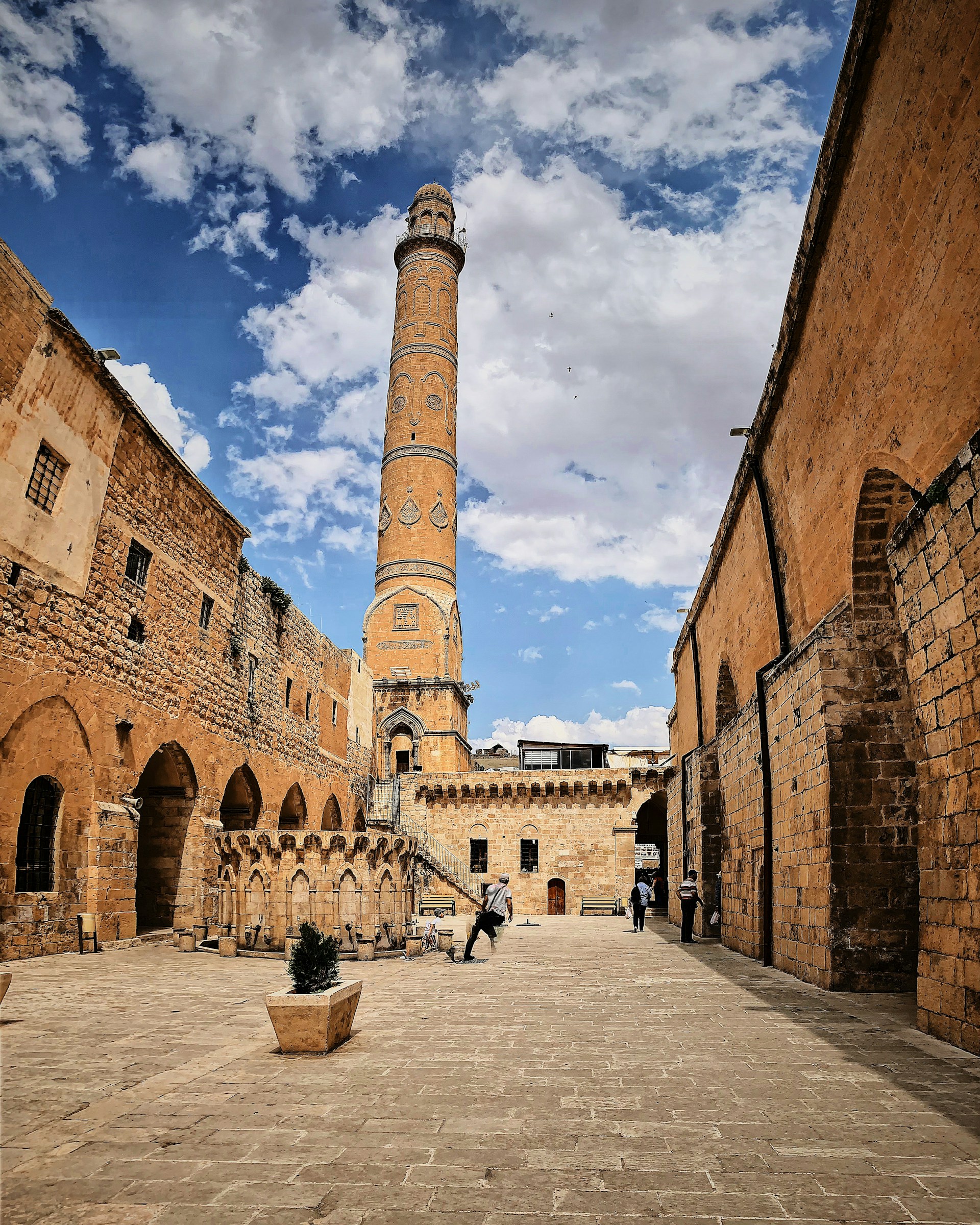 a tall tower with a clock on it's side