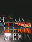 five assorted Vogue magazines