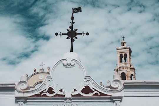 white and black cross cathedral in Andros Greece