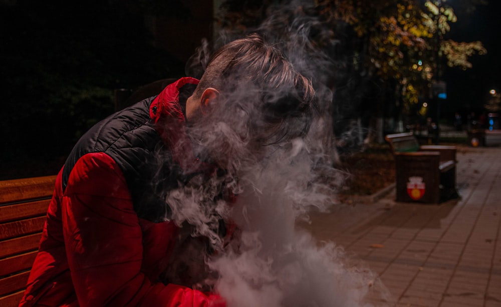 man wearing red and black jacket