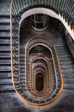 architectural photography,how to photograph bauhaus style stairway in budapest, hungary; spiral staircase
