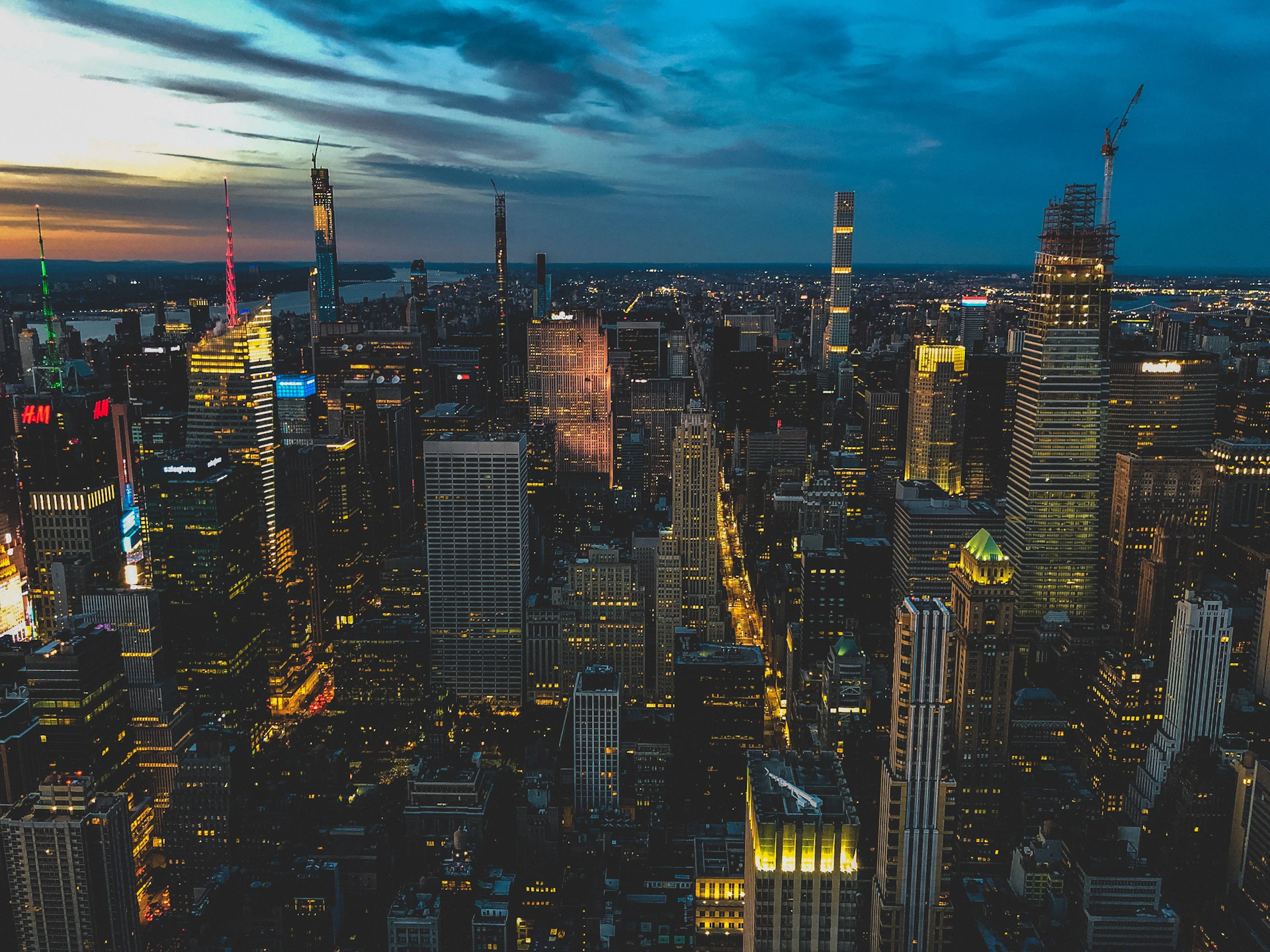 aerial photography of assorted-color concrete buildings under blue sky