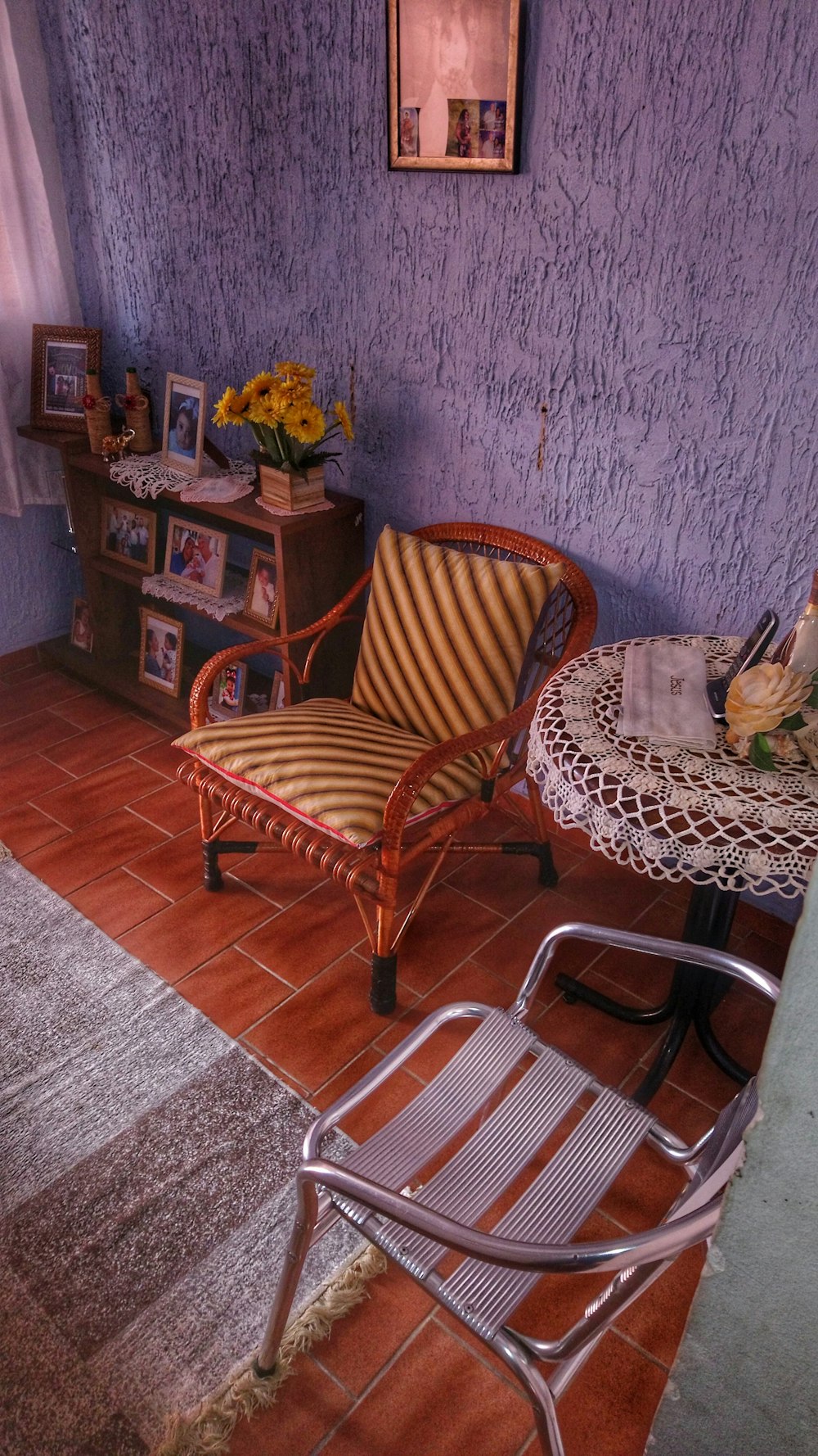 red and beige armchair beside table