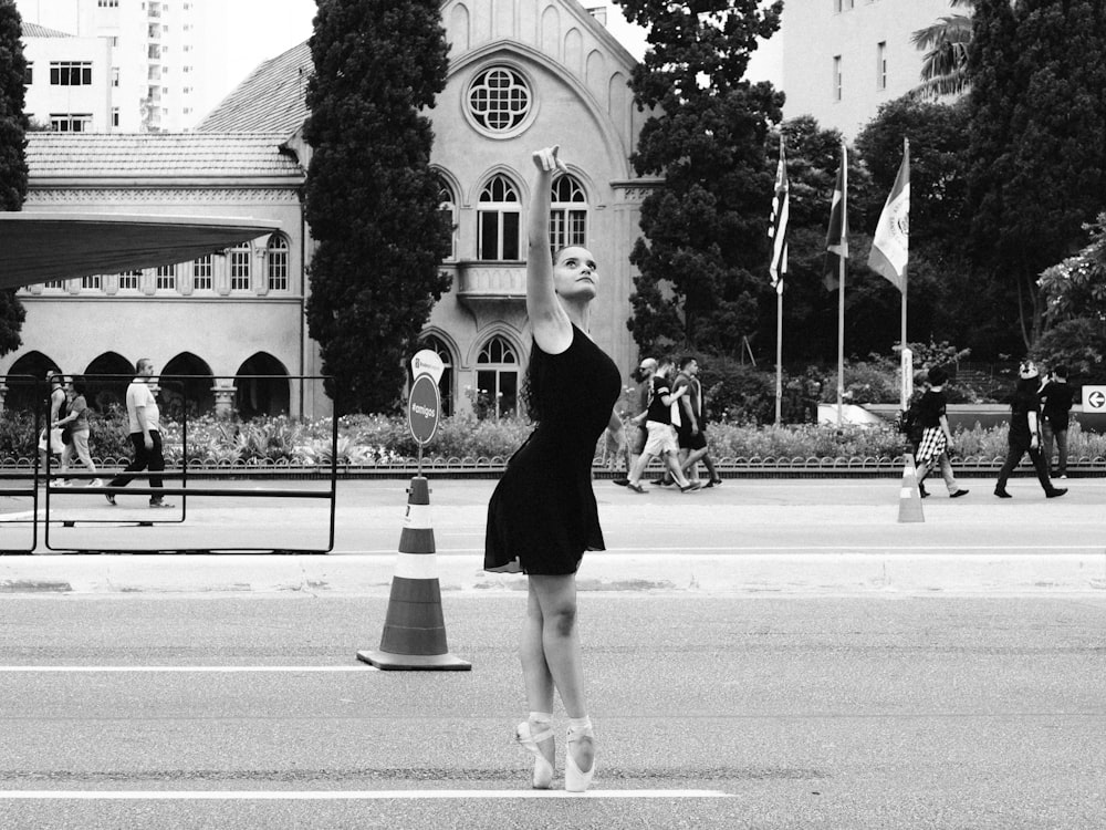 a black and white photo of a ballerina