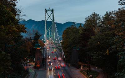 photography of vehicles traveling on road during daytime