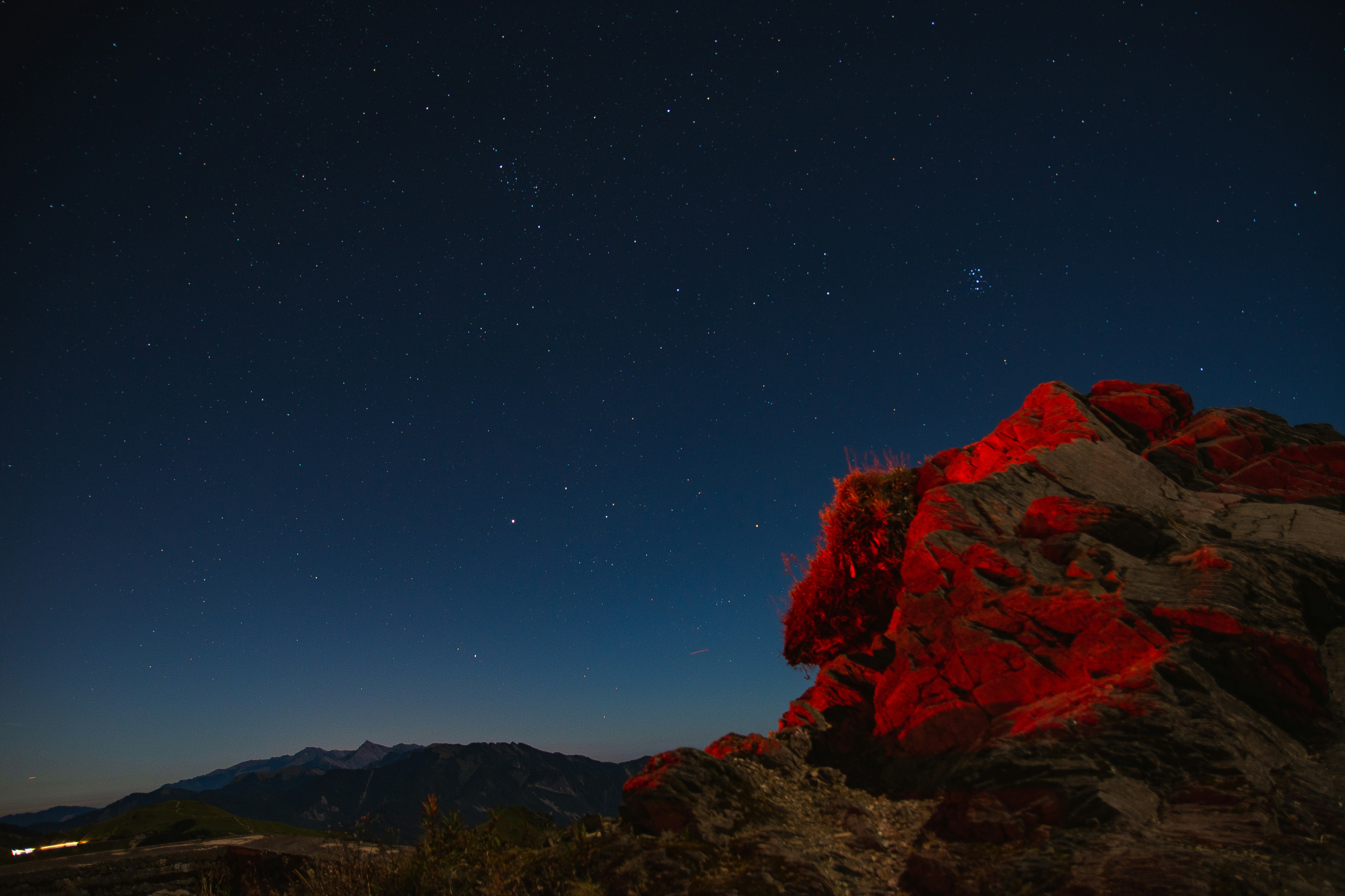 The red light cover on the rock under the Starry sky in Taiwan 