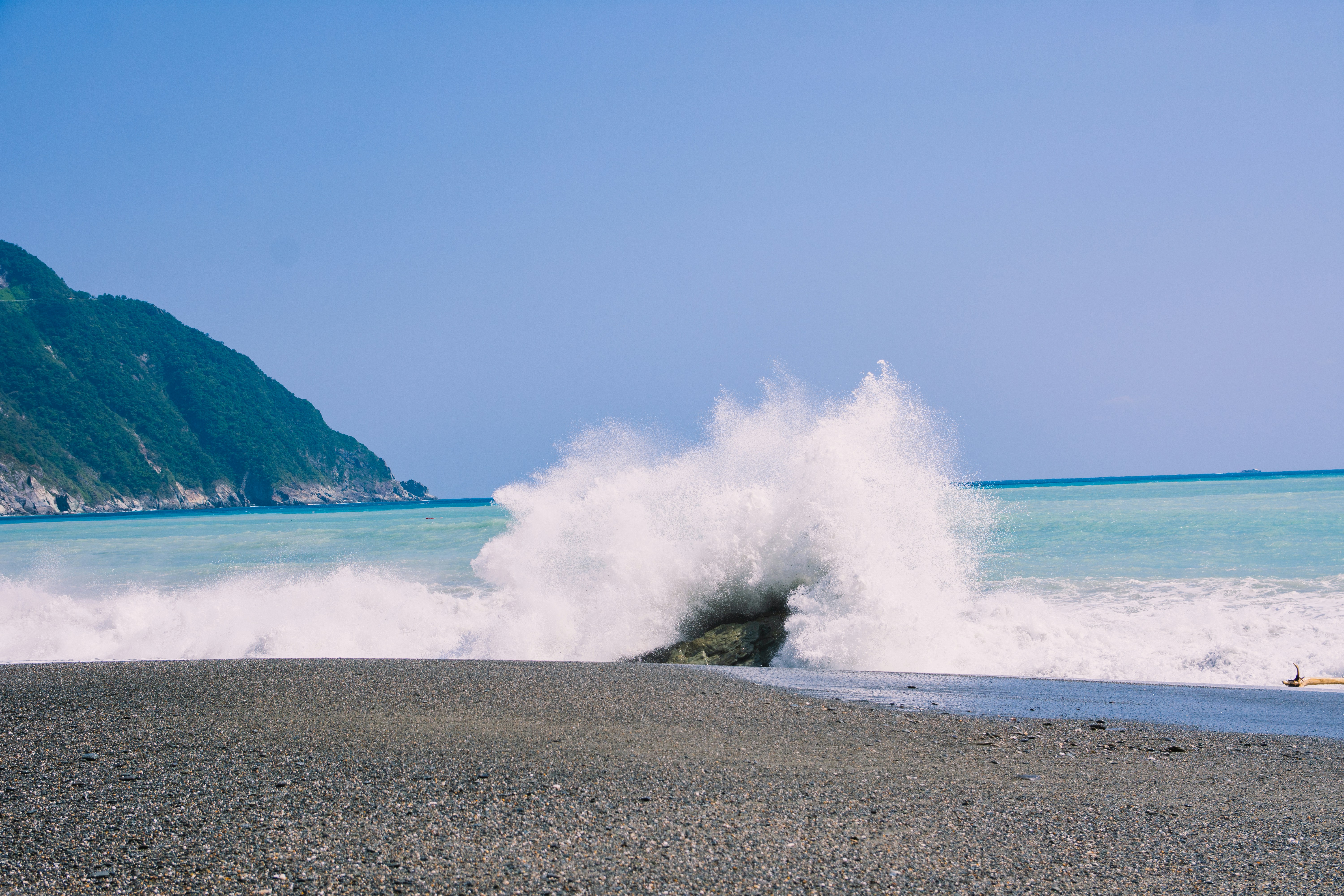 seashore under blue sky