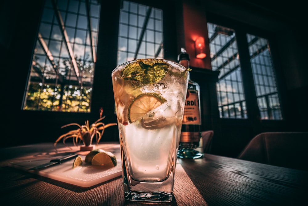 clear glass cup on wooden surface