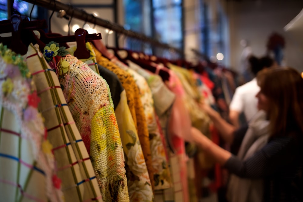 woman standing and choosing clothes