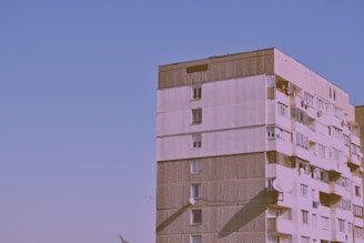 A panoramic view of a multi-unit residential building with a durable roof.