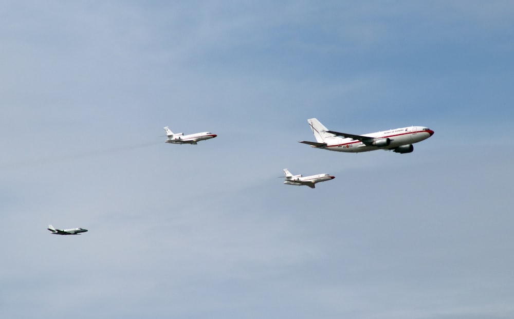 four white airliners