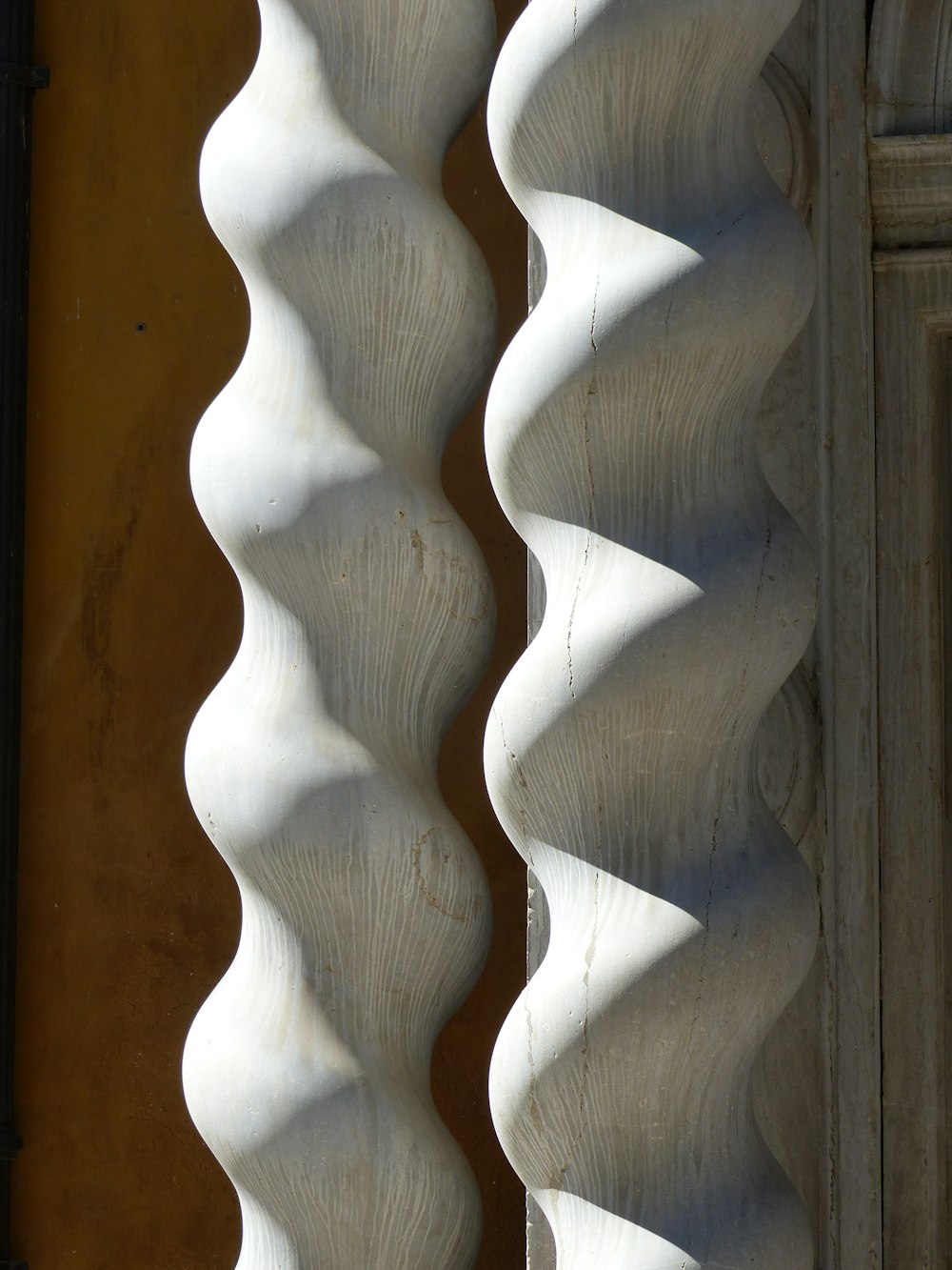 white ceramic columns