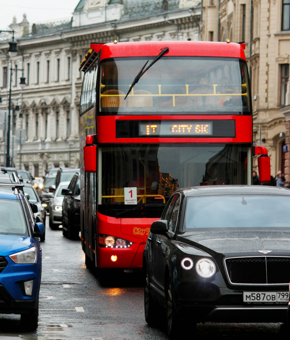 red bus near buildings