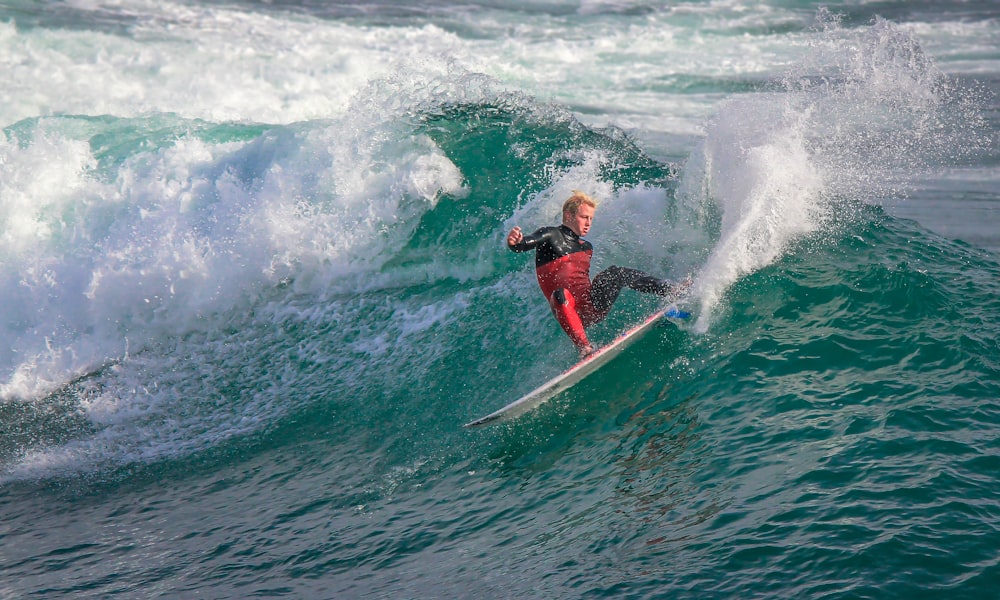 man surfing photograph